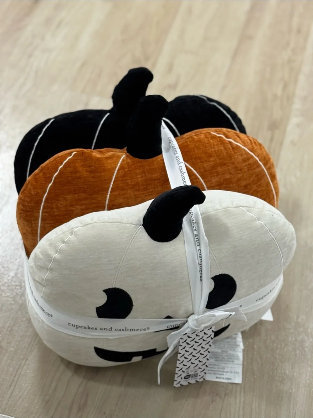 cupcakes & cashmere Pumpkin Stack Decorative Pillows in Cream, Orange, Black